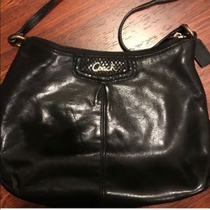 Black leather coach cross body bag