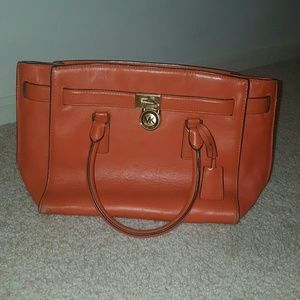 Michael Kors orange handbag