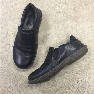 Born black leather clogs