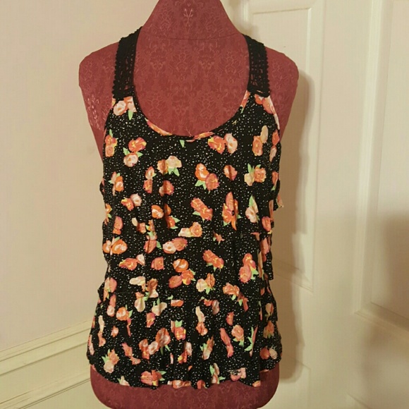 Ruffled floral blouse with crochet detailing