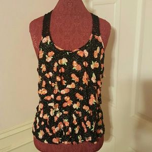 Ruffled floral blouse with crochet detailing