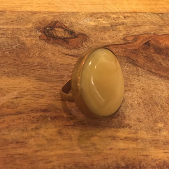 Cream colored swirl stone and brass ring