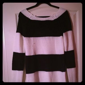 Black and white, striped sweater.