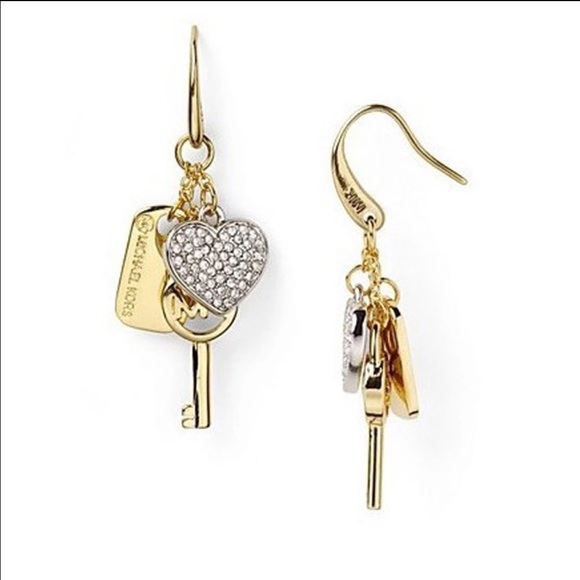 Lovely gold tone and silver tone dangle earrings.