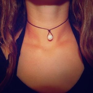 Fresh water pearl leather necklace.