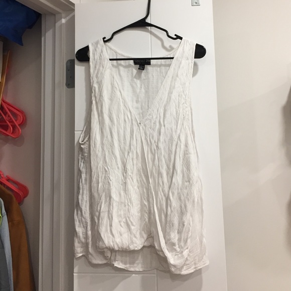White sleeveless V neck top
