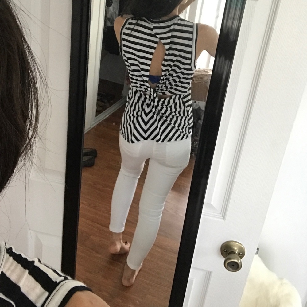 A.L.C. Twisted knot on back