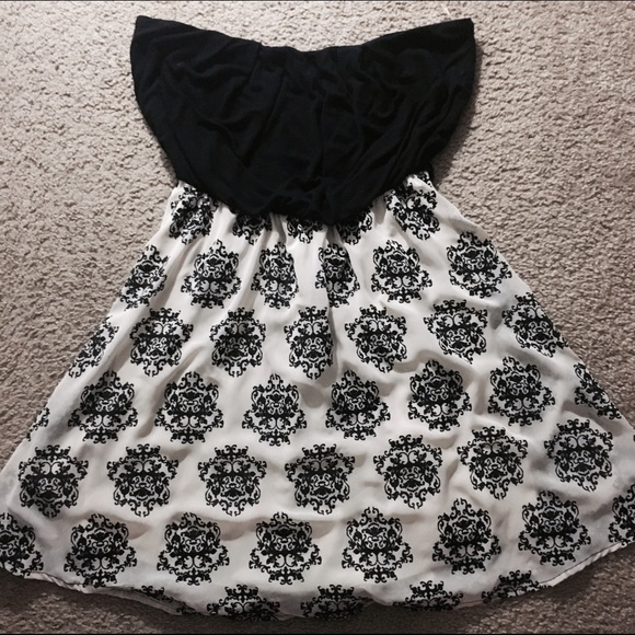 Strapless black dress with detailed bottom