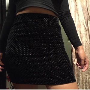 Black Glittery velvet skirt.
