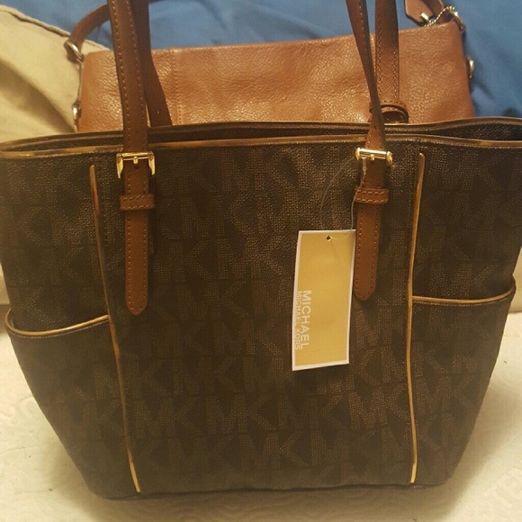 Michael kors brown with gold outline