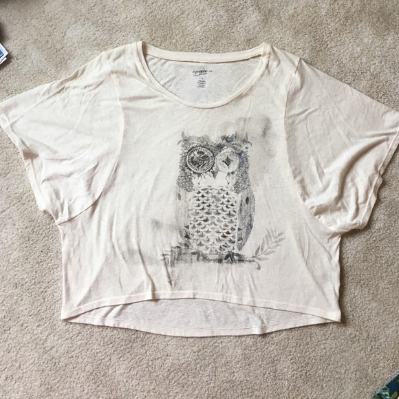 Loose fitting cream shirt with owl