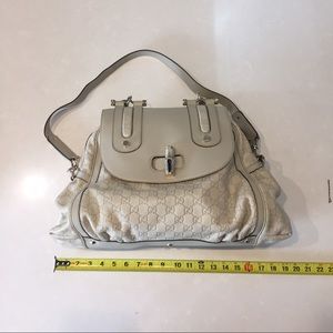 Authentic Gucci signature leather shoulder bag.