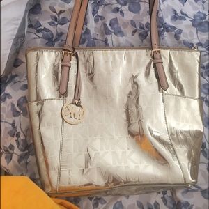 Gold Michael Kors purse