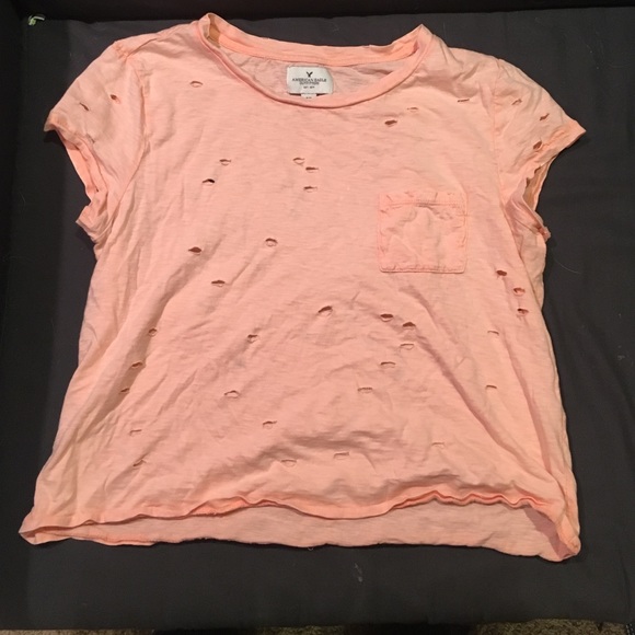 Peach colored shirt