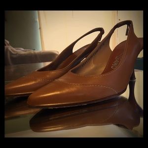 Caramel-colored, leather slingbacks.