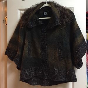 Warm cape style sweater.