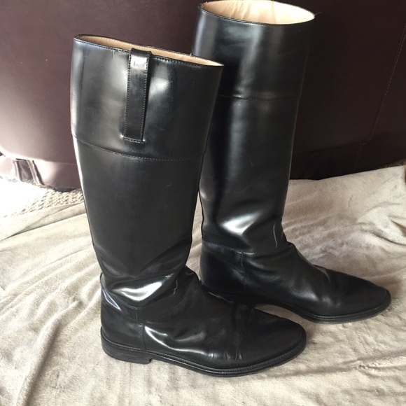 Black Michael Kors riding boots