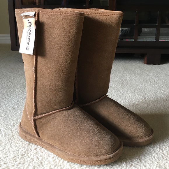 Never worn Bear Paw boots.