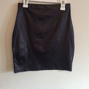 Black leather look mini skirt