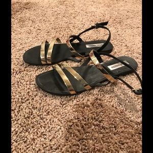 Black and gold Steve Madden sandals