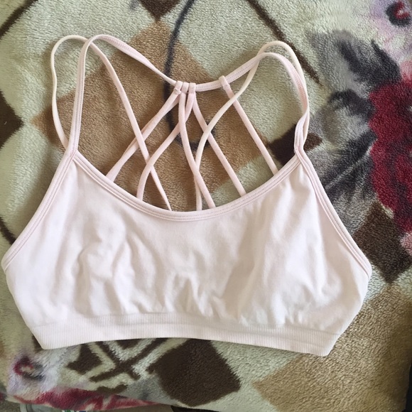 Fabletics pink criss cross back sports bra