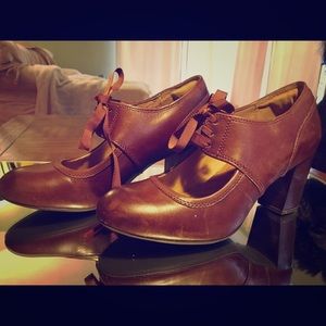Brown, leather, chunky heel with lace-up front.