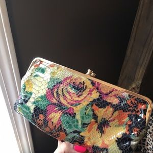Authentic discontinued pattern hobo Int. clutch