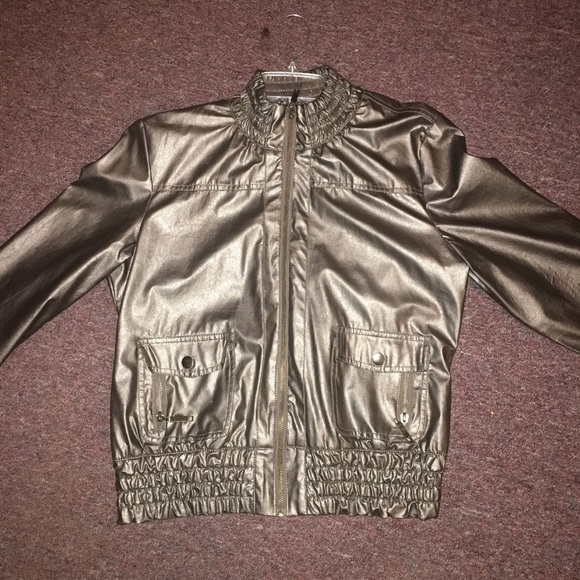 Dark grey metallic jacket.