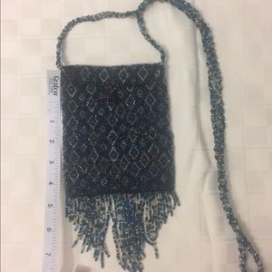 Beaded small cross body bag with flap closure