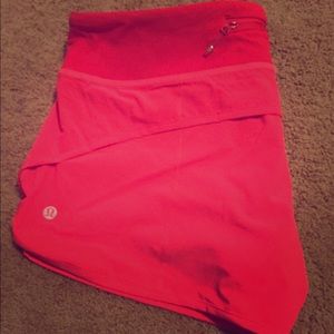 Red Lululemon speed shorts.