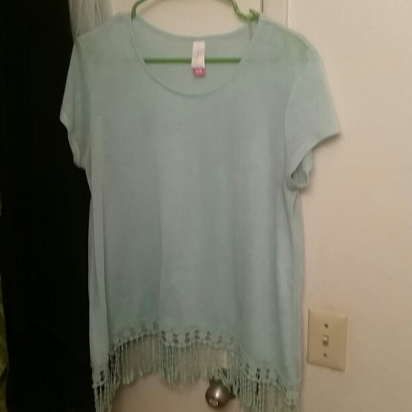 Short Sleeve. Fringe Type Bottom.