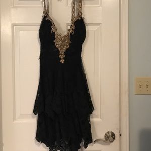 Black lace with gold detail cocktail dress
