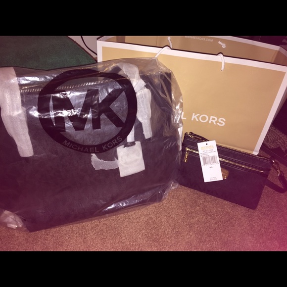 Mk jetbag & wristlet
