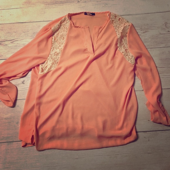 Peach blouse with cream lace accent