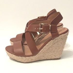 Brown cross-cross strap wedges