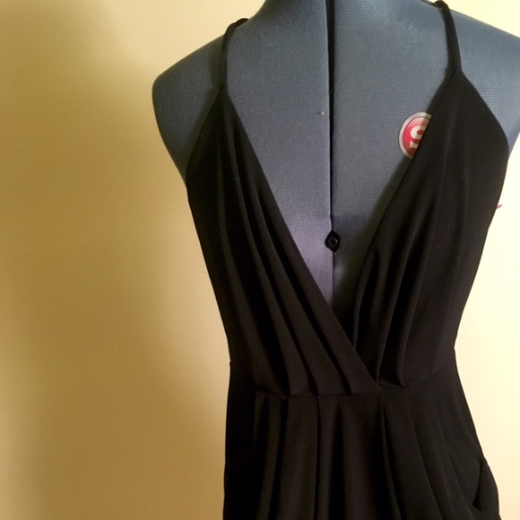 BCBG Grecian style layers on this hip black dress