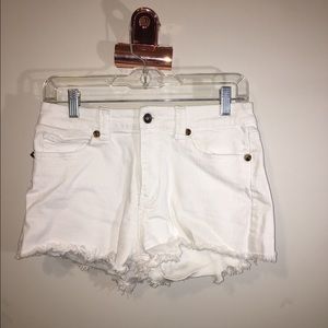 White, gold studded shorts