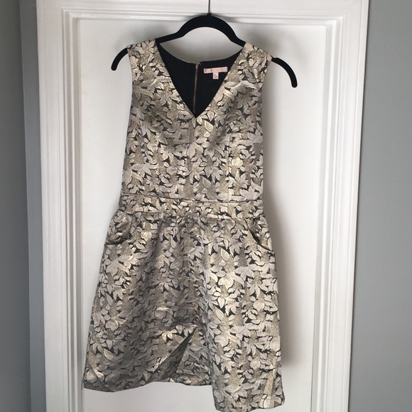 Gold and black party dress with pockets.