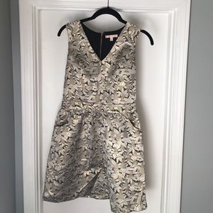 Gold and black party dress with pockets.