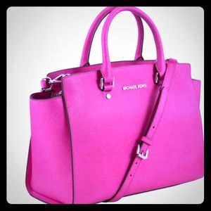 Michael Kors fuchsia satchel.