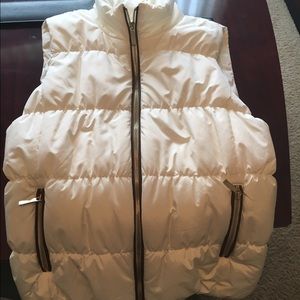 Cream colored Michael Kors puffy vest