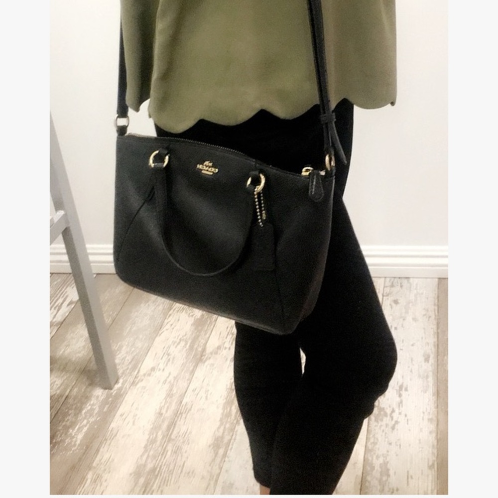 Black coach purse. Cross body