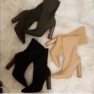 Black pointed toe high ankle booties
