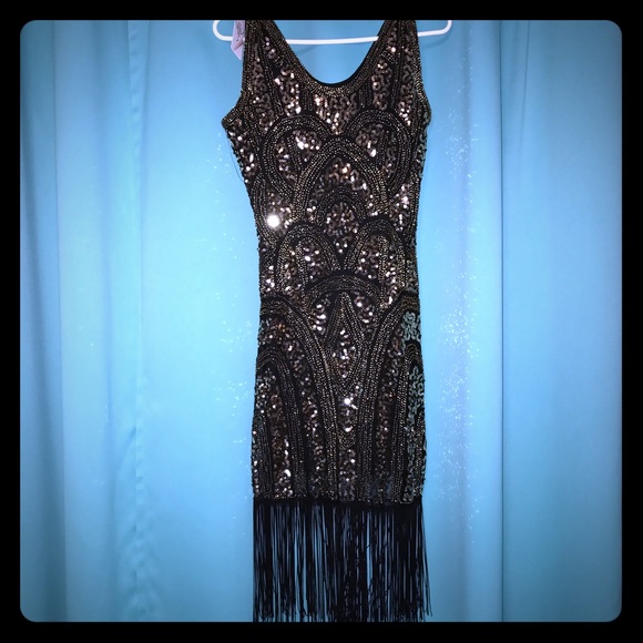 Black and gold fringe 1920s flapper dress