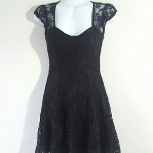Black lace cap sleeve skater dress