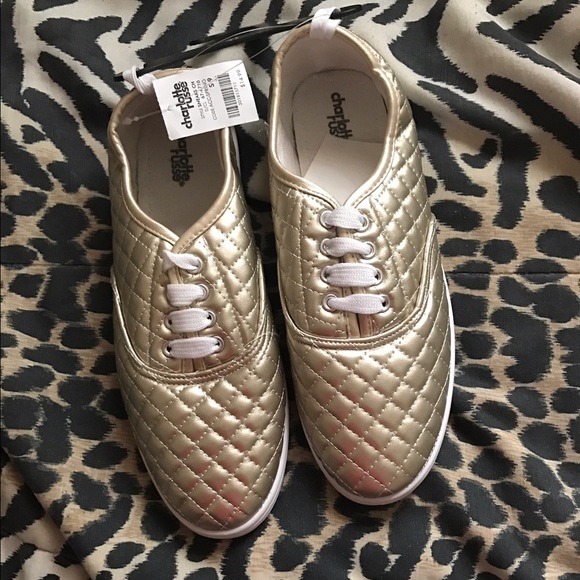 Never worn gold shoes from Charlotte Russe.