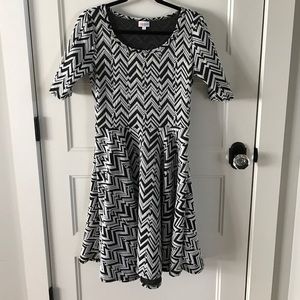 Black and White Nicole. Only worn once.