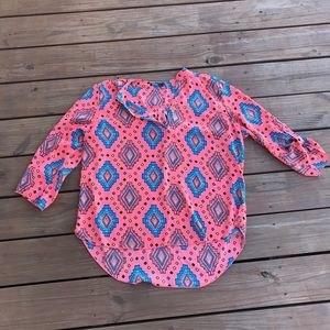 Peach/orange colored blouse with pattern