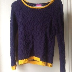 Blue know sweater with gold trim