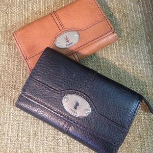 Two Tan and Black Fossil Wallets